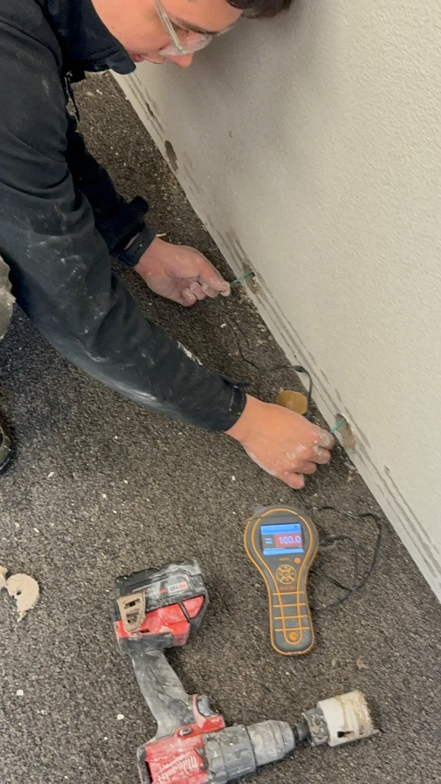 inspecting wall